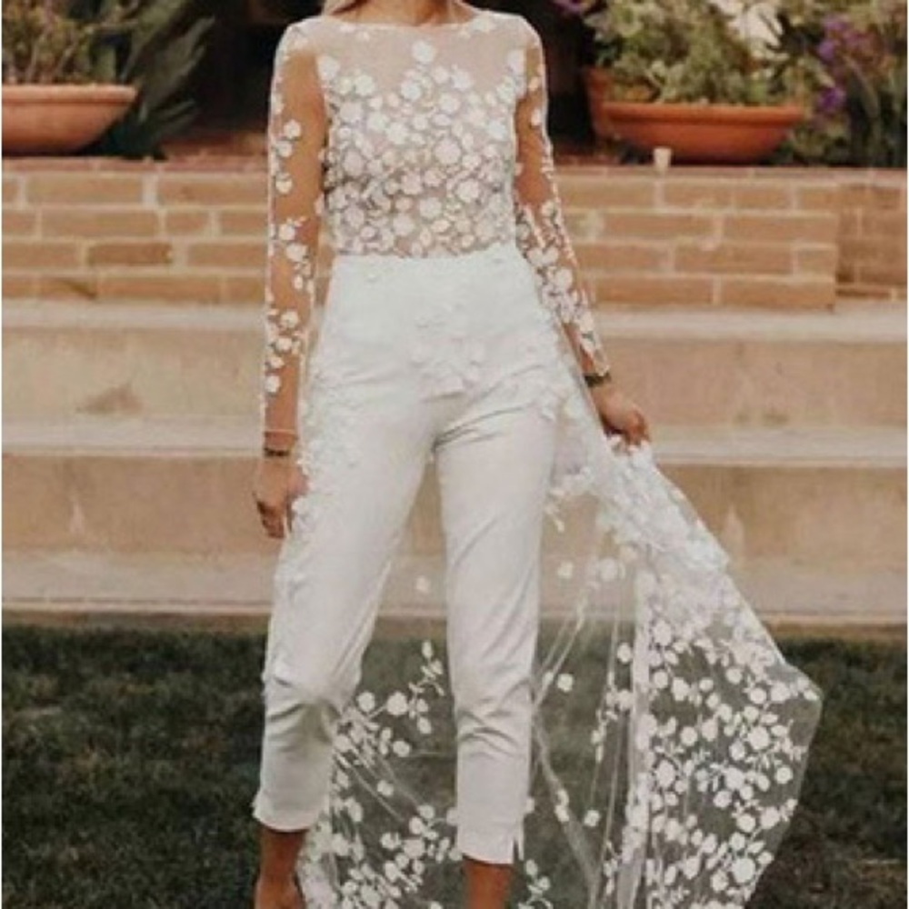 Elegant backless wedding jumpsuit with detailed lace train